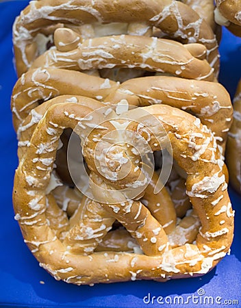 Heap of traditional pretzel on table Stock Photo