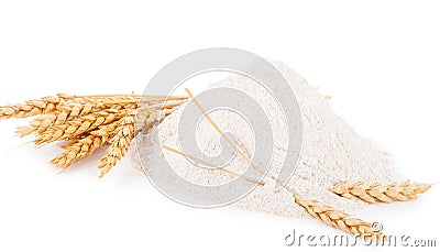 Heap of wheat flour with spikelets Stock Photo