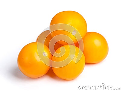 Heap of yellow tomatoes Stock Photo