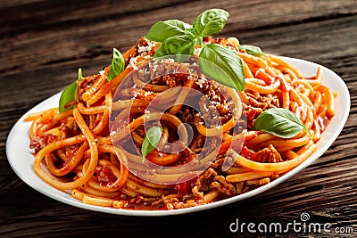 Heaped plate of Italian spaghetti Bolognaise Stock Photo