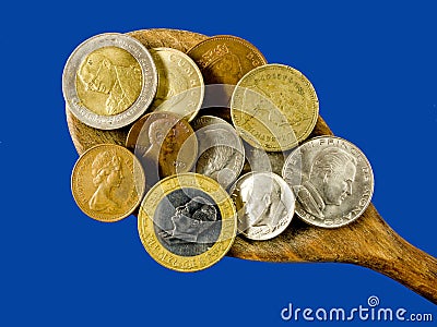 Heaping spoonful for the world economy, closeup. Stock Photo