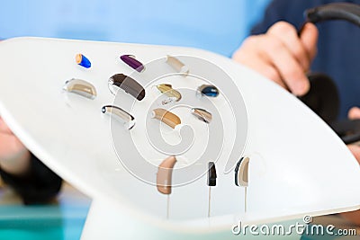 Hearing aid on a presentation table Stock Photo