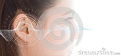 Hearing test showing ear of young woman with sound waves simulation technology Stock Photo