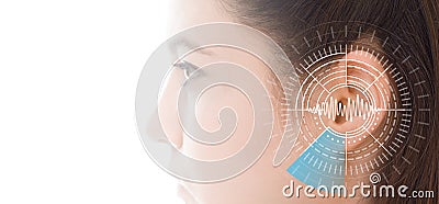 Hearing test showing ear of young woman with sound waves simulation technology Stock Photo