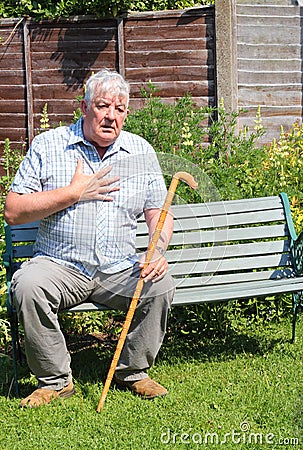 Heart attack or difficulty breathing, elderly man. Stock Photo