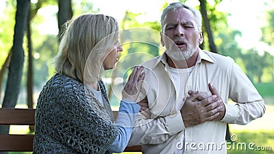 Heart attack risk, pensioner suffering from strong chest pain, healthcare Stock Photo
