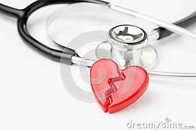 Heart attact or broken heart concept, cute read heart break with Stock Photo