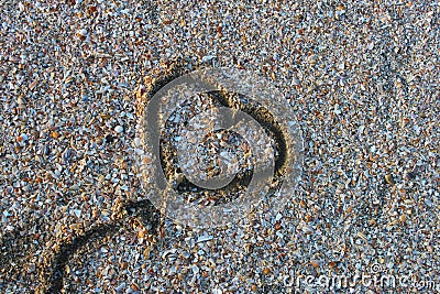 Heart balloon shape drawn at the beach Stock Photo