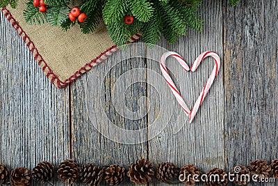 Heart Candycanes On Rustic Wood Background for the Holiday Stock Photo