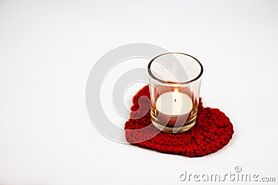 Heart crochet coaster and candle Stock Photo