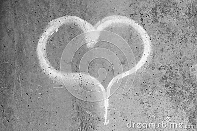 Heart drawn in chalk on a gray concrete wall Stock Photo