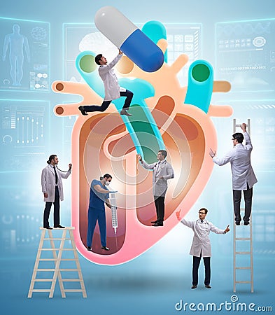 The heart examination by team of doctors Stock Photo