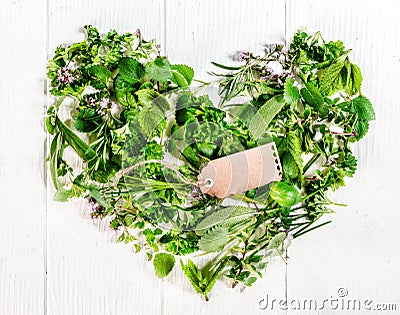 Heart formed of fresh culinary herbs Stock Photo