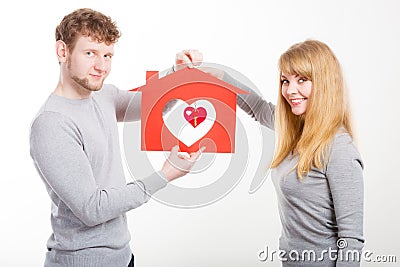 Heart within house. Stock Photo