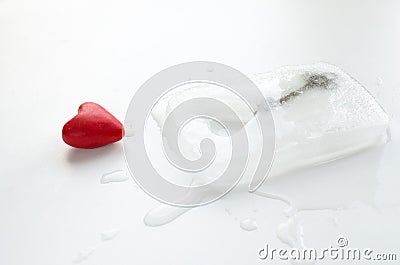 Heart and key frozen in a block of ice Stock Photo