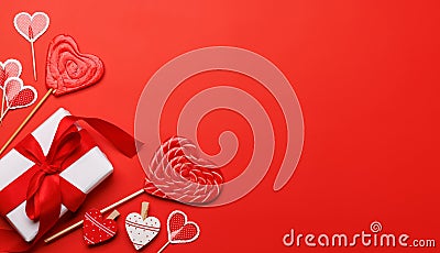 Heart lollipops: Sweet treats on a red backdrop with text space Stock Photo