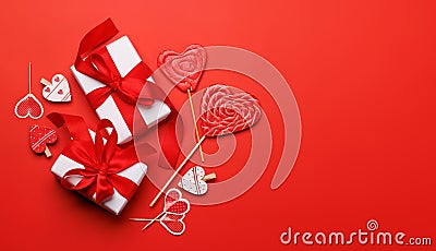 Heart lollipops: Sweet treats on a red backdrop with text space Stock Photo