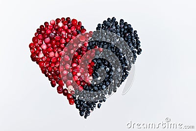 Heart made of berries cranberries and blueberries. Stock Photo