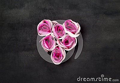 Heart of pink roses on black backgraund Stock Photo