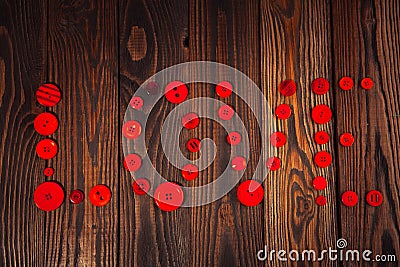 Heart of red buttons, the concept of Valentine's Day, wooden bac Stock Photo