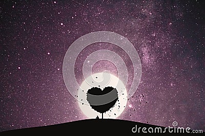 Heart shape of big tree and alone man sitting on a mountain under love tree landscape with fantasy night sky and full moon. Stock Photo