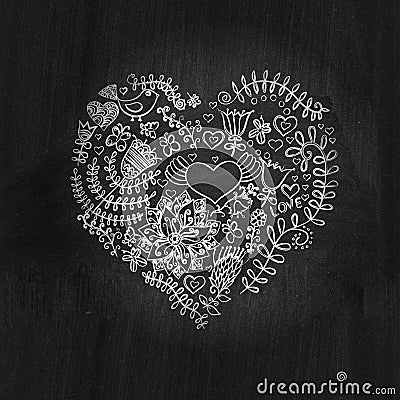 Heart shape chalk drawing on chalkboard blackboard.Floral heart. Stock Photo