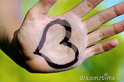 Heart shape drawed on a male human hand Stock Photo