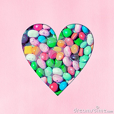 Heart shape filled with small colourful candies Stock Photo