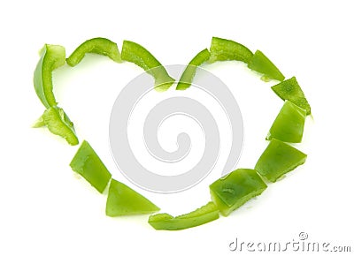 Heart shape formed with chopped green pepper on Stock Photo