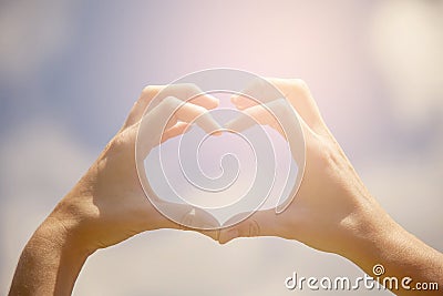 Heart shape hands Stock Photo