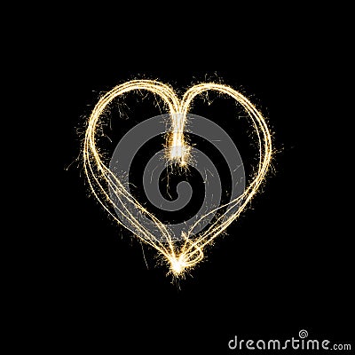 Heart shape lightpainting with sparklers isolated on black Stock Photo