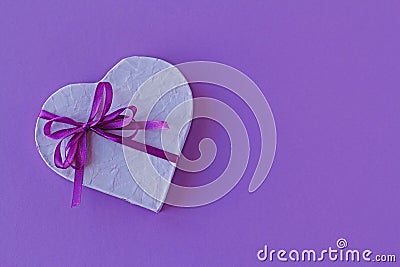 Heart shape present box with ribbon bow Stock Photo