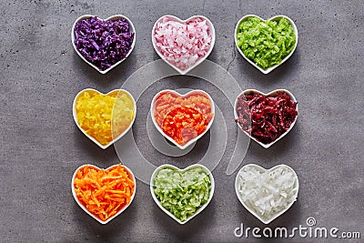 Heart-shaped bowls with healthy ingredients Stock Photo
