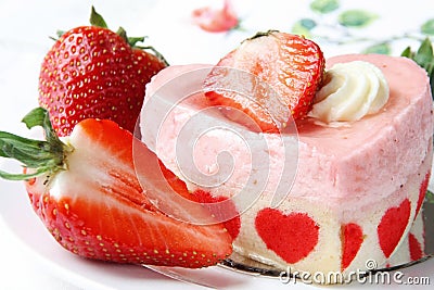 Heart shaped cake with strawberries Stock Photo