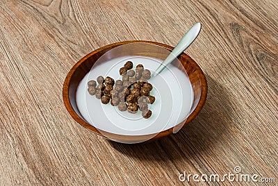 Heart shaped cereal chocolate balls in milk Stock Photo