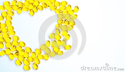 Heart shaped of cod liver oil isolated on white background with copy space. Source of Omega-3 DHA+EPA and vitamin A & D helps gr Stock Photo