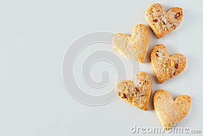 Heart shaped cookie pattern on a white background Stock Photo