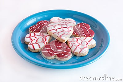 Heart shaped cookies on blue plates Stock Photo