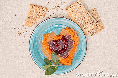 Heart shaped fresh salad and cookies for Valentine's Day. Stock Photo