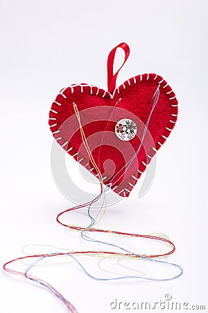 Heart shaped pincushion. Stock Photo