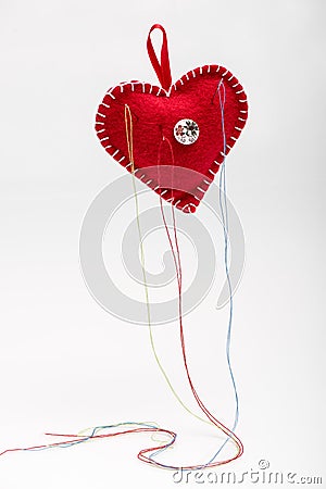 Heart shaped pincushion. Stock Photo