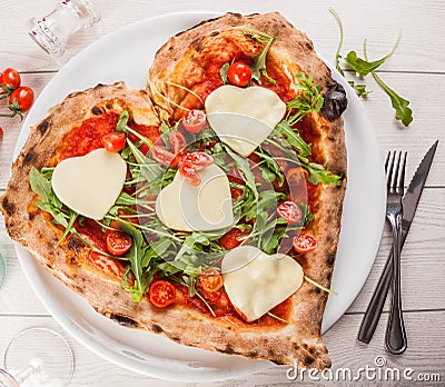 Heart shaped pizza Stock Photo