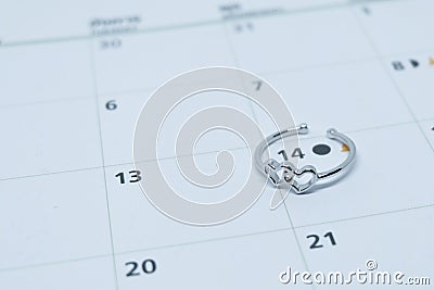 Heart shaped wedding ring Stock Photo