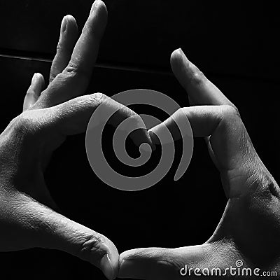 Heart sign by finger in black and white Stock Photo