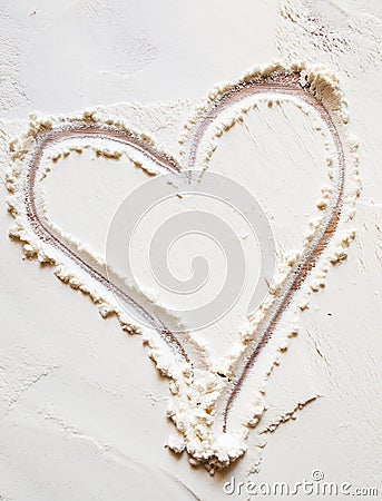 Heart sign on the flour Stock Photo