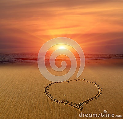 Heart sign on sand Stock Photo