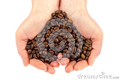 Heart symbol of bean coffee in feminine hand Stock Photo
