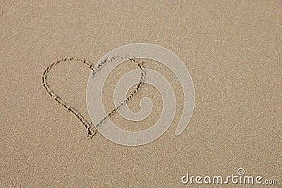 A heart symbol on the sandy beach Stock Photo