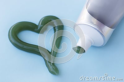 Heart symbol from toothpaste. Concept of dental care Stock Photo