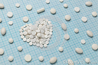 Heart treatment with drugs. Cardiovascular diseases. Life with the constant intake of pills Stock Photo